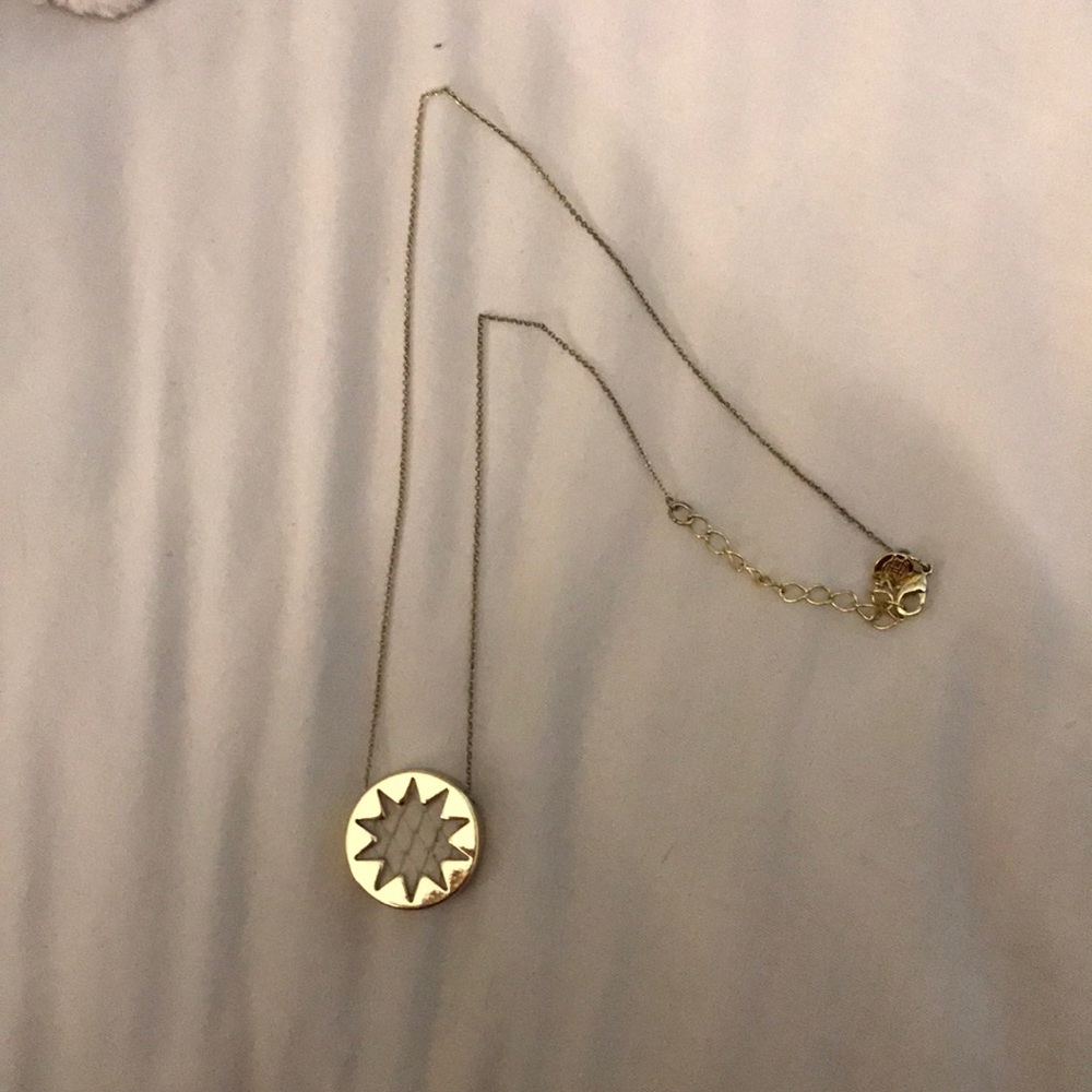 Off whits snake skin sunburst necklace